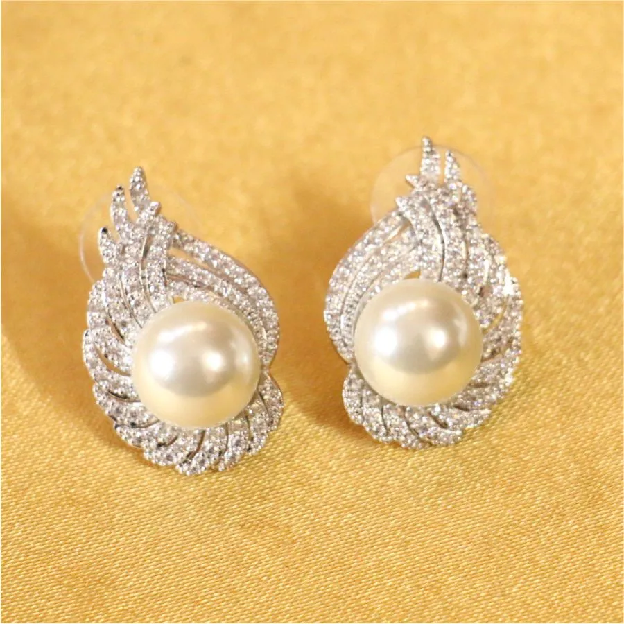 Gorgeous looking pearl and AD studs