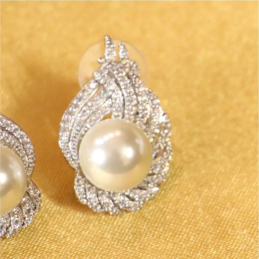 Gorgeous looking pearl and AD studs