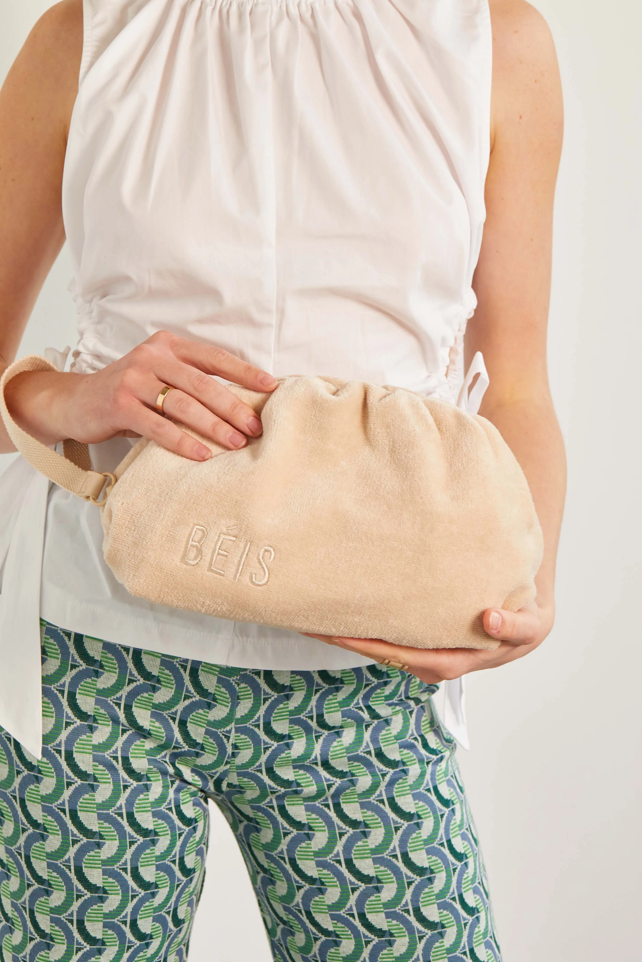 The Terry Cosmetic Clutch in Beige